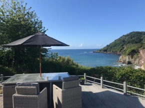 Beach Front House with Stunning Sea Views and Free Use of a Local Indoor Pool